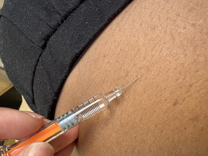 A careful subcutaneous injection demonstration
